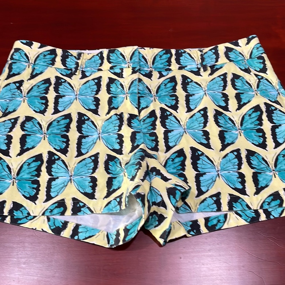 Lands’ End size 12, low rise zipper front button shorts, butterfly pattern